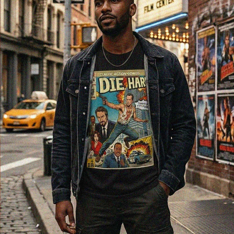 Retro-inspired t-shirt by SukiPrime, showcasing a vintage comic book cover art style of the "Die Hard" movie, perfect for fans of classic action films