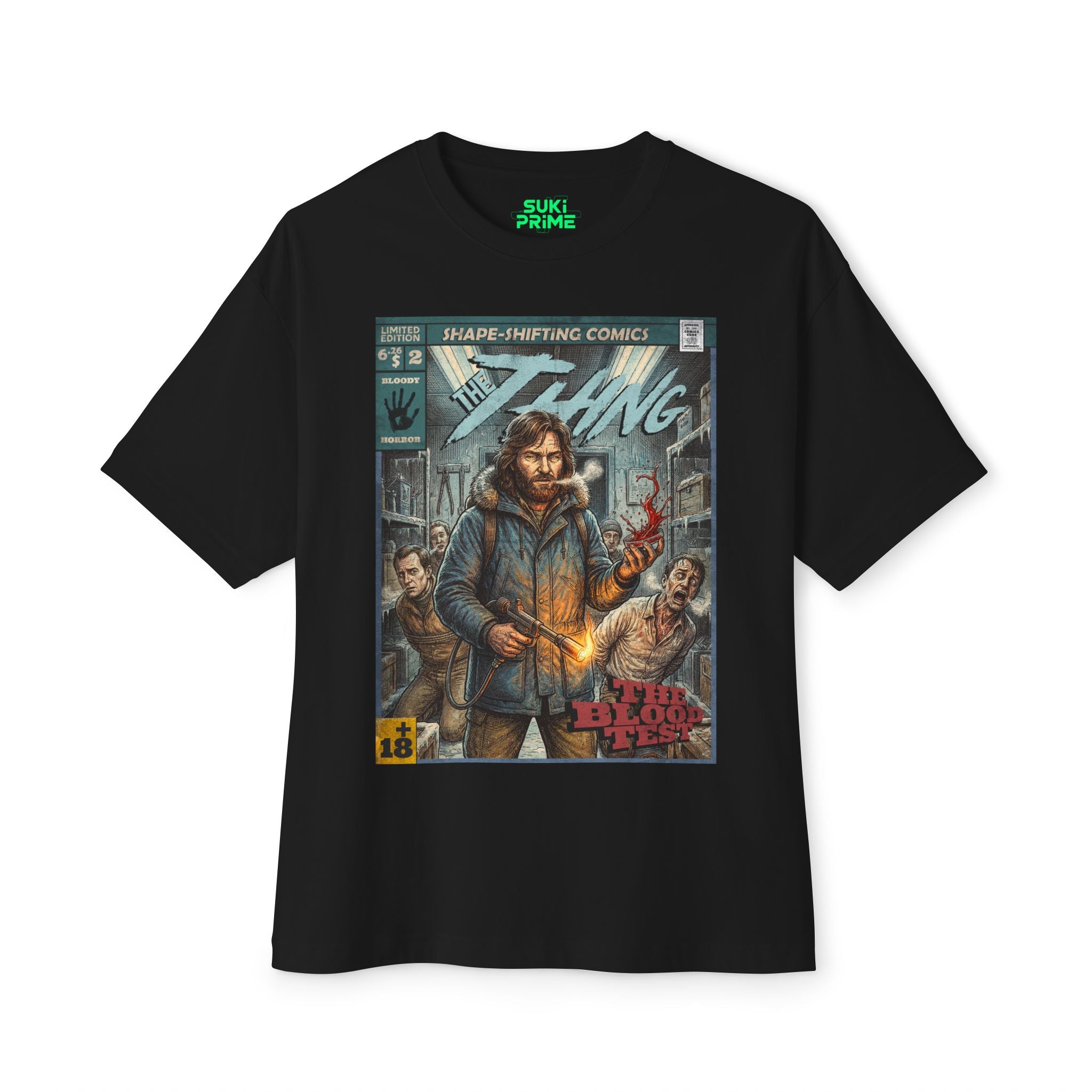 Oversized black t-shirt featuring a retro comic book graphic of John Carpenter's The Thing. The design depicts MacReady holding a flamethrower alongside a blood test dish, highlighted under the title "Shape-Shifting Comics." Ideal for horror movie enthusiasts and vintage style lovers.
