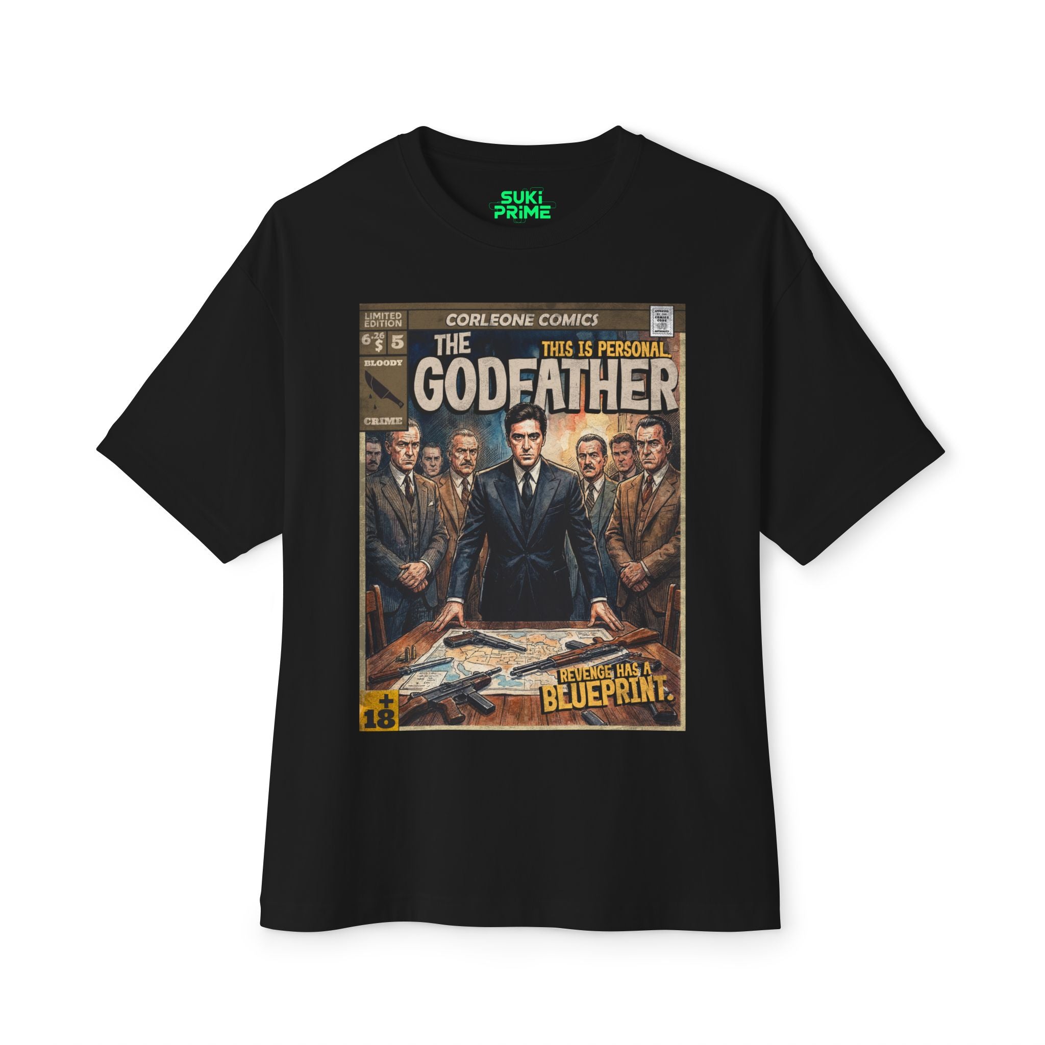 A black oversized t-shirt featuring a vintage comic book cover design titled "The Godfather" by Corleone Comics. The graphic shows Michael Corleone at a table with maps and weapons, surrounded by men in suits. The text includes "This is personal" and "Revenge has a blueprint," capturing a retro, gritty aesthetic