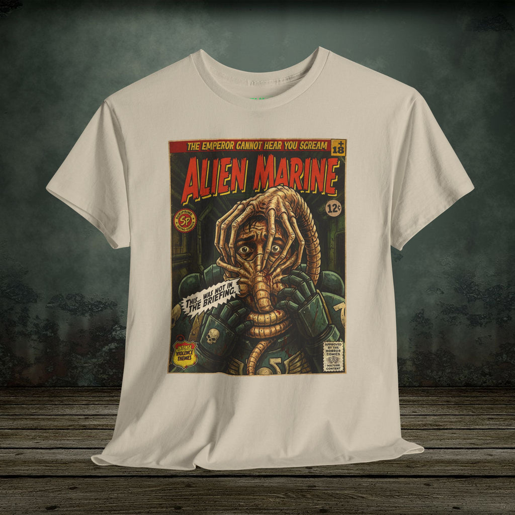 White t-shirt with 'Alien Marine' graphic design on a dark wooden surface and background