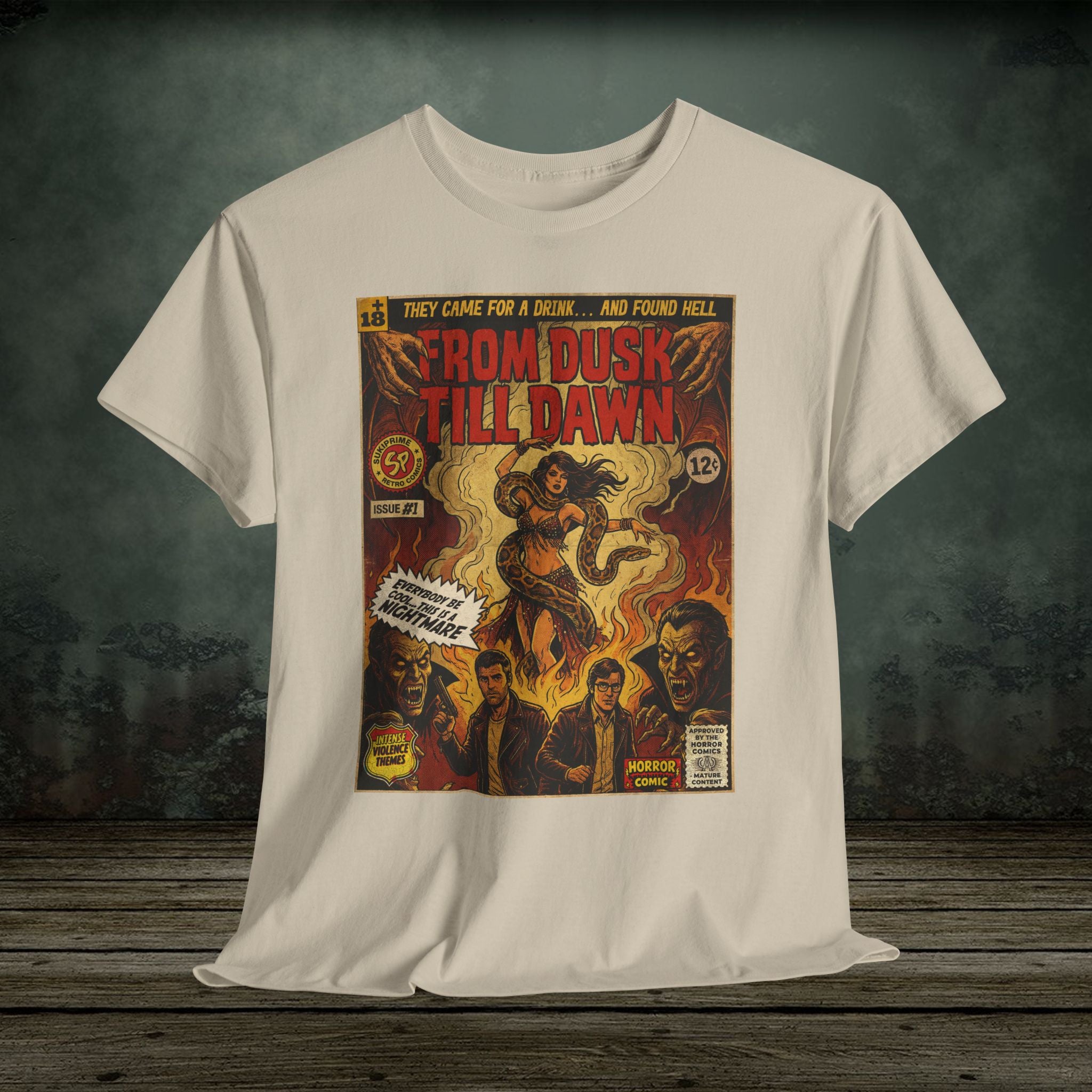 White t-shirt with a graphic design of 'From Dusk Till Dawn' on a wooden surface with a dark background