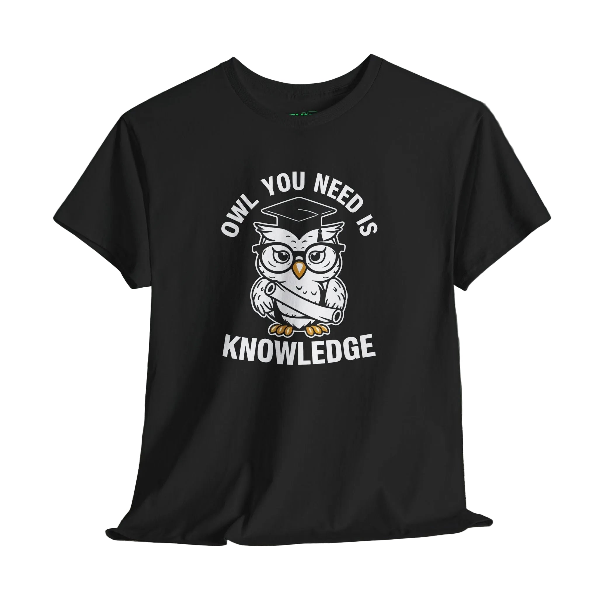 Black t-shirt with an owl graphic and text on a wooden surface and dark background