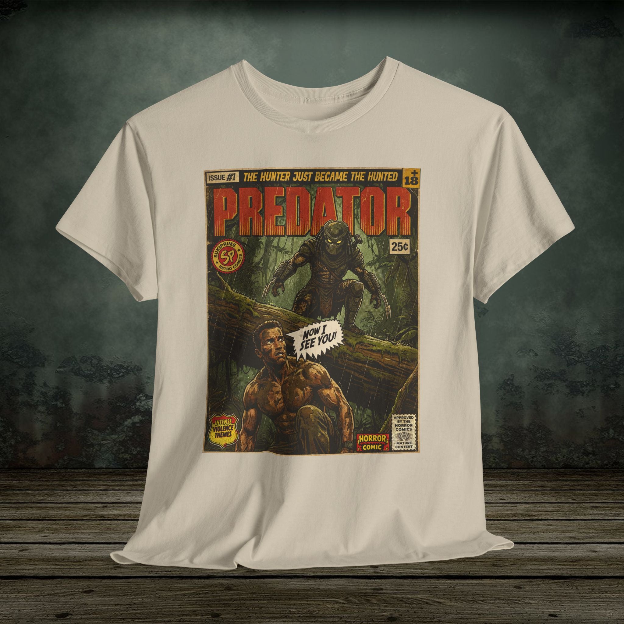 White t-shirt with 'Predator' comic book cover design on a wooden surface with a dark background