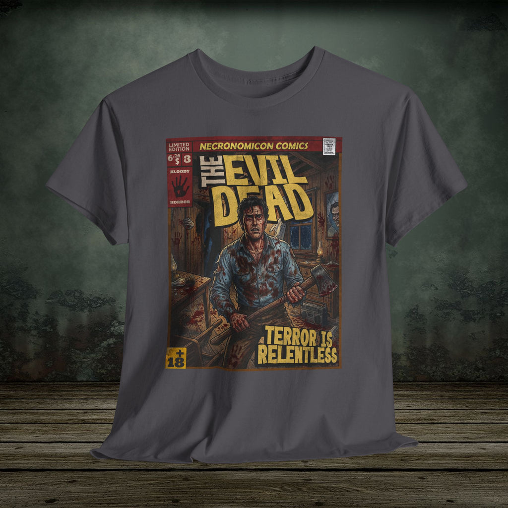 Gray t-shirt with 'The Evil Dead' comic book cover graphic on a wooden surface.